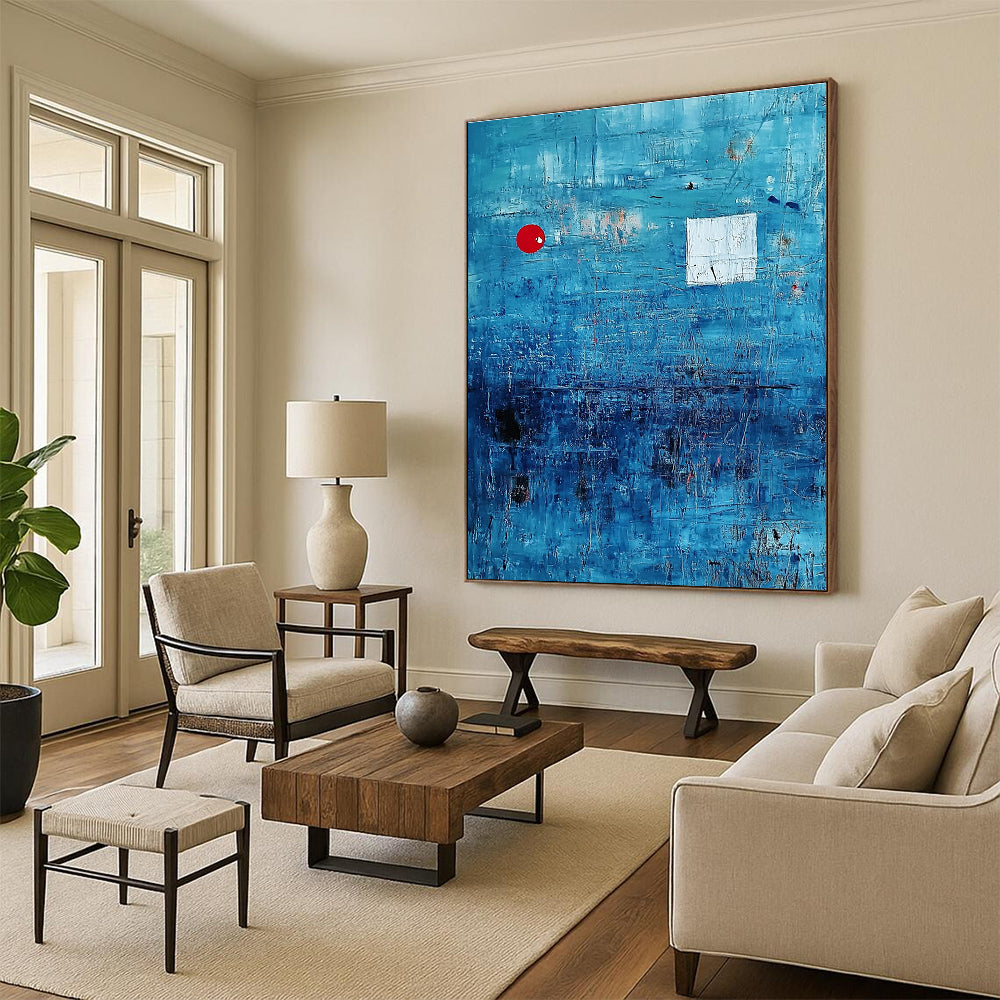 Large abstract painting featuring a serene blue ocean with textured brush strokes and dynamic black lines, accented by a small red circle and white squares.STSC041