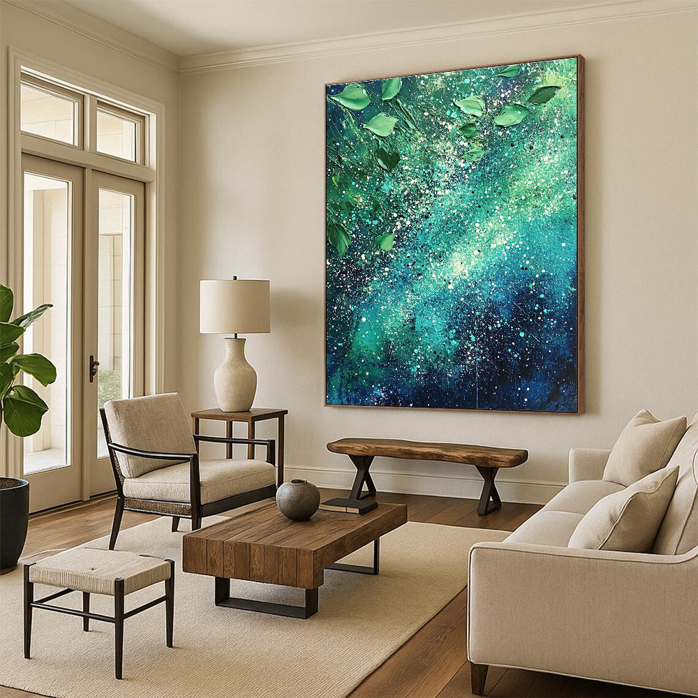 Large abstract painting of the Milky Way featuring vibrant green and blue hues with white speckles and scattered leaves for texture and cosmic beauty.STSC065