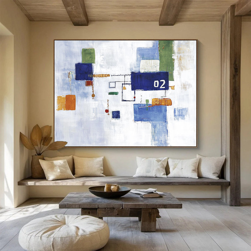 Large abstract painting featuring a white sky and blue and green cityscape with simple shapes and the number 02 at the center.SC182