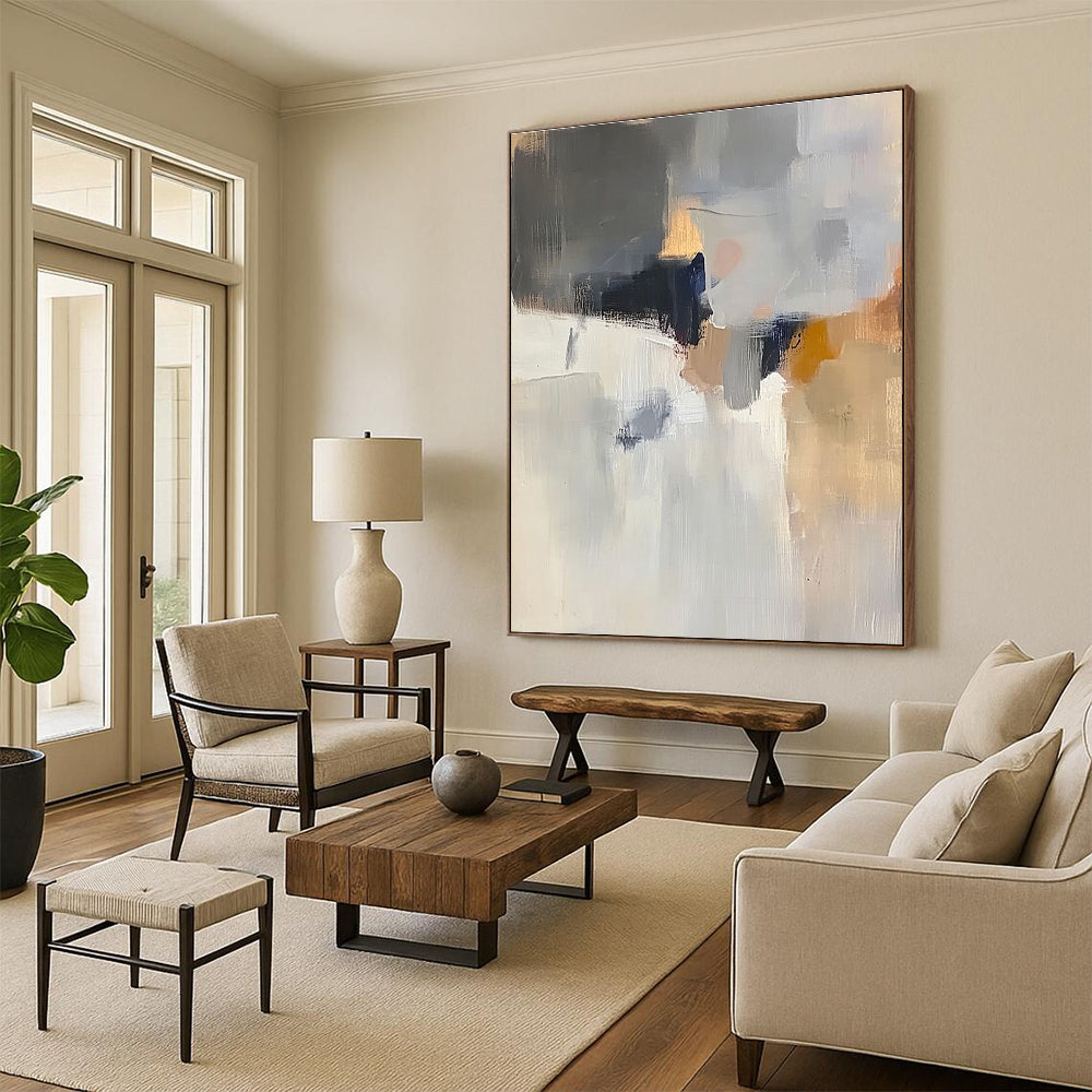 Large abstract painting with soft light colors grey and white atmospheric shapes hints of brown blue and yellow in muted tones.STSC686