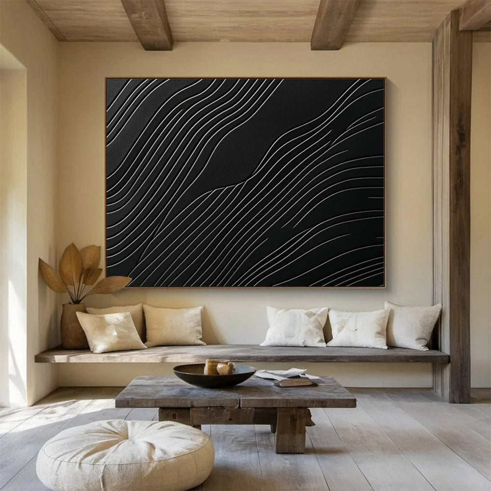 A large abstract artwork featuring elegant wave patterns on a matte black surface, showcasing layered textures and high contrast between light and dark tones.SC575