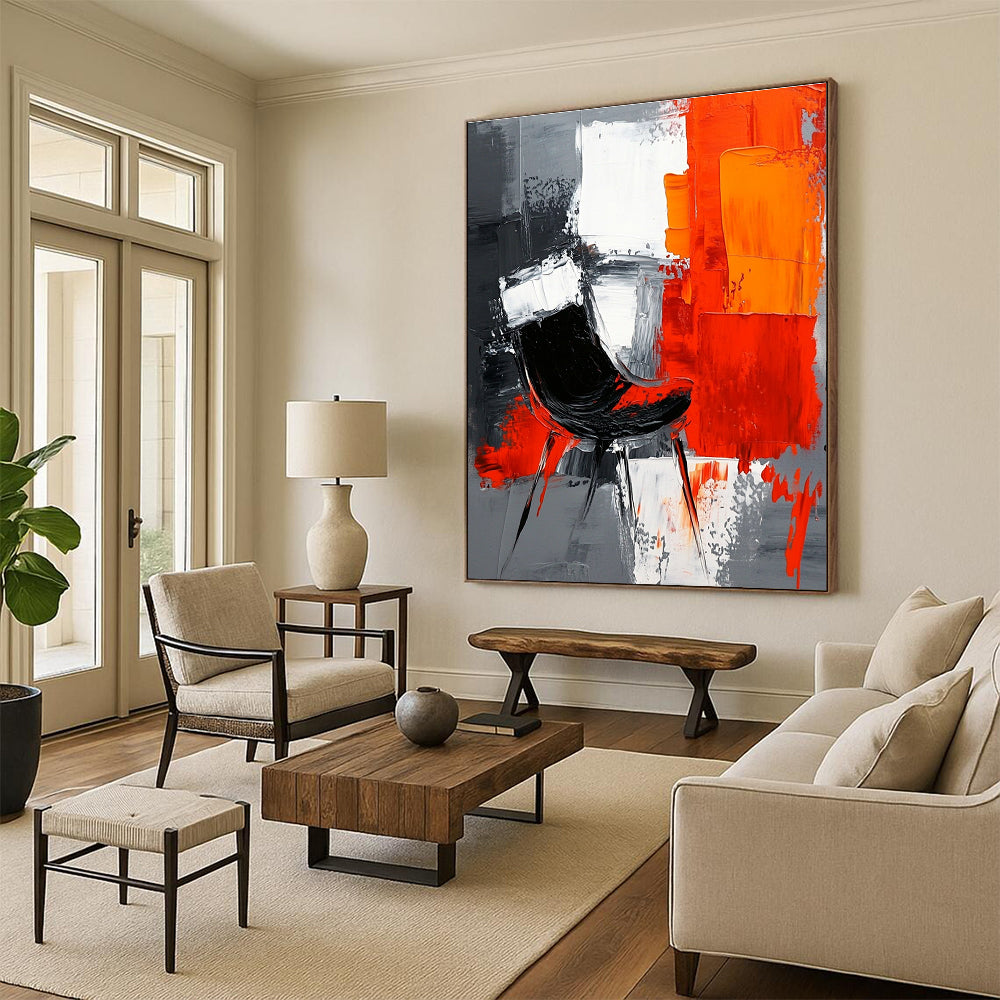 Large abstract painting with gray background featuring white and orange shapes and a contrasting black chair created with oil paint on textured paper.STSC226