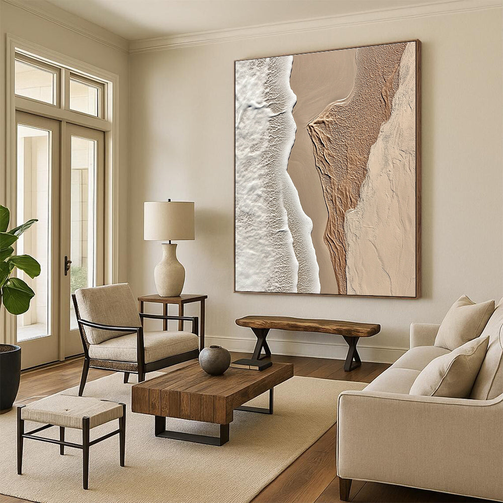 A large abstract painting featuring intricate textures of beige sand and white waves capturing the tranquility of coastal landscapes.STSC1294