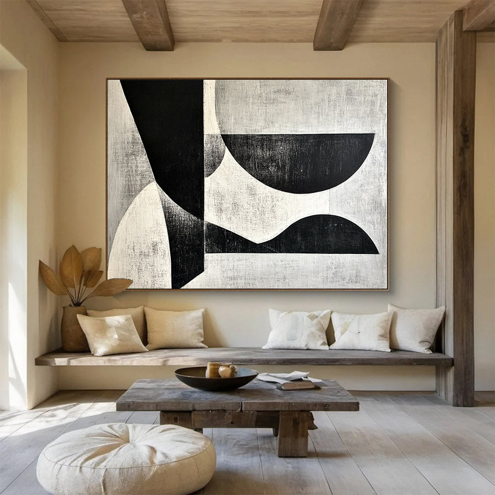 A large abstract painting featuring black and white shapes on a gray background inspired by Wim de Vries artistic style.SC506