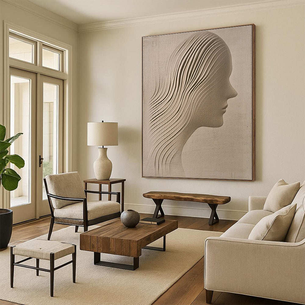 A large abstract painting featuring a sand-colored textured wall with an ethereal woman's silhouette gracefully carved into it.STSC1213