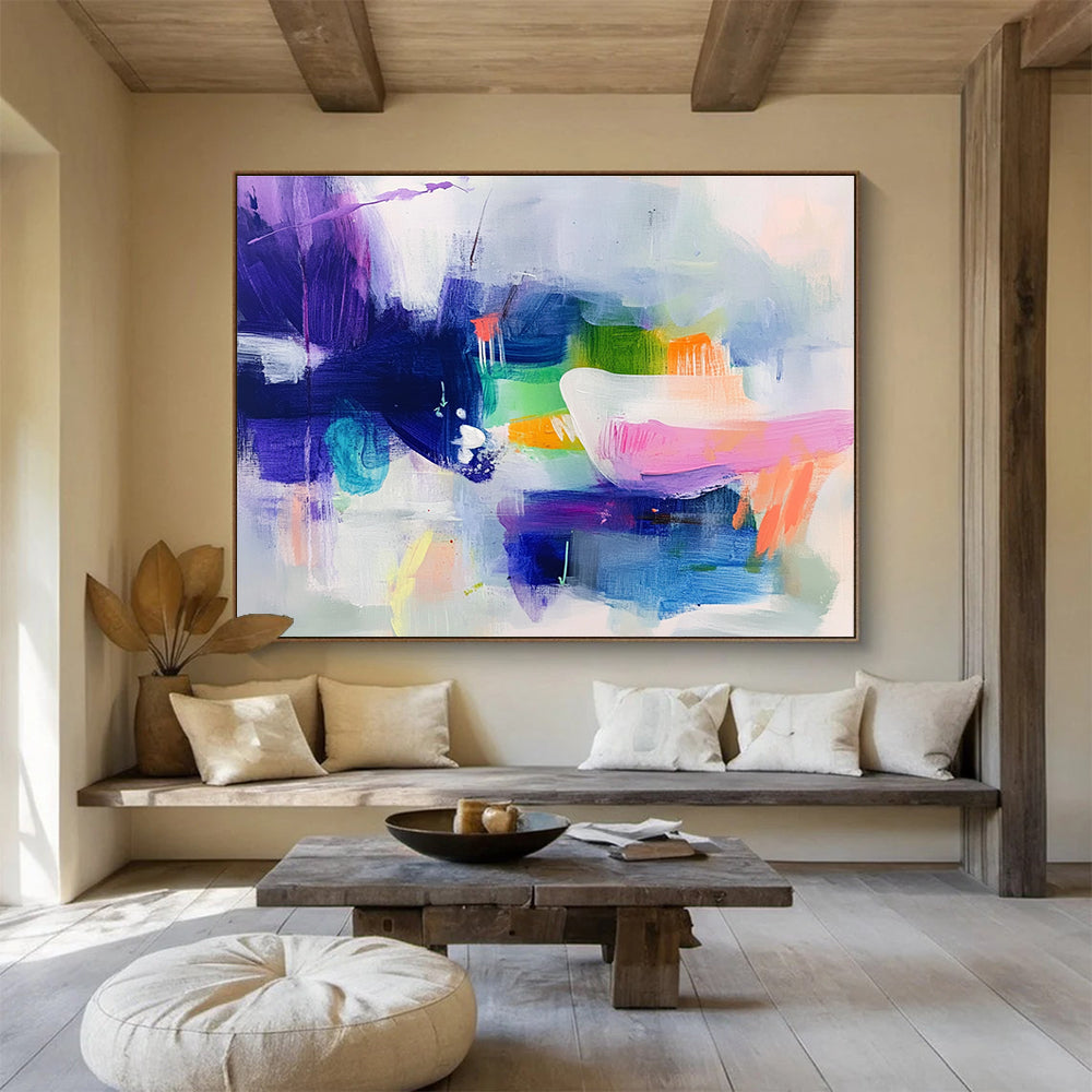 Large abstract painting featuring cool colors with soft shapes suggesting houses and flowing water creating a serene dreamy atmosphere.SC342