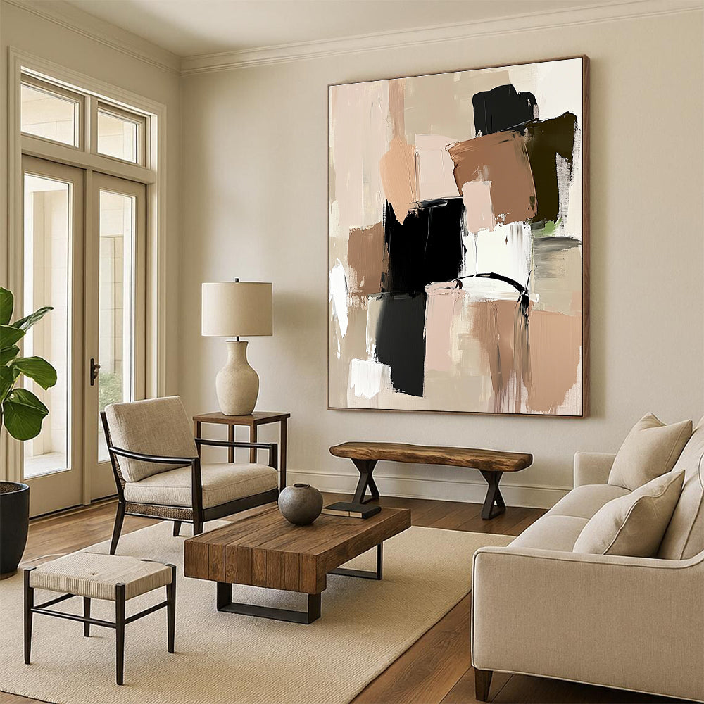 Large abstract painting featuring neutral tones beige and black shapes soft pink and green accents on a beige background with loose brush strokes.STSC779