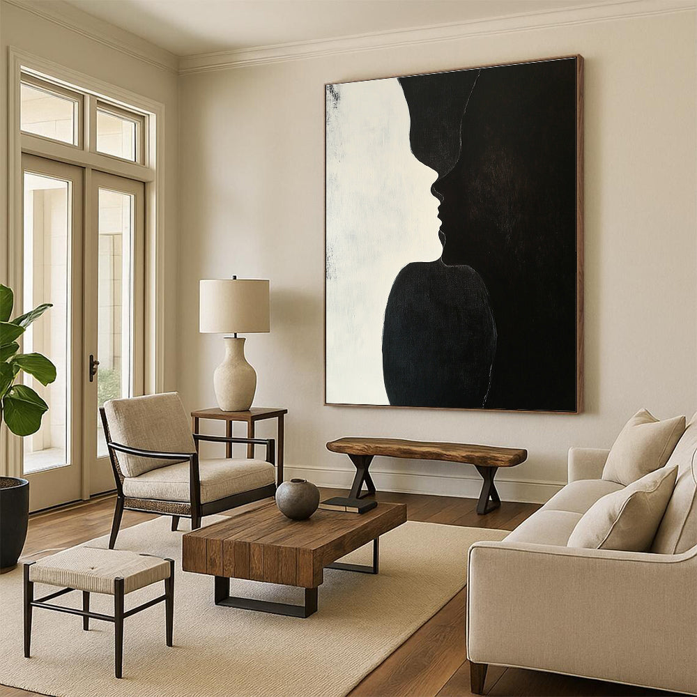 A large abstract painting featuring two figures kissing against a plain black background with subtle shadows highlighting their forms and textures.STSC909