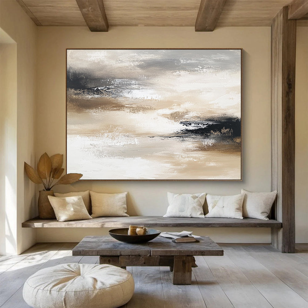 Large abstract painting in neutral tones evokes calmness with layers of soft grays browns beige whites and black creating movement and depth.SC246