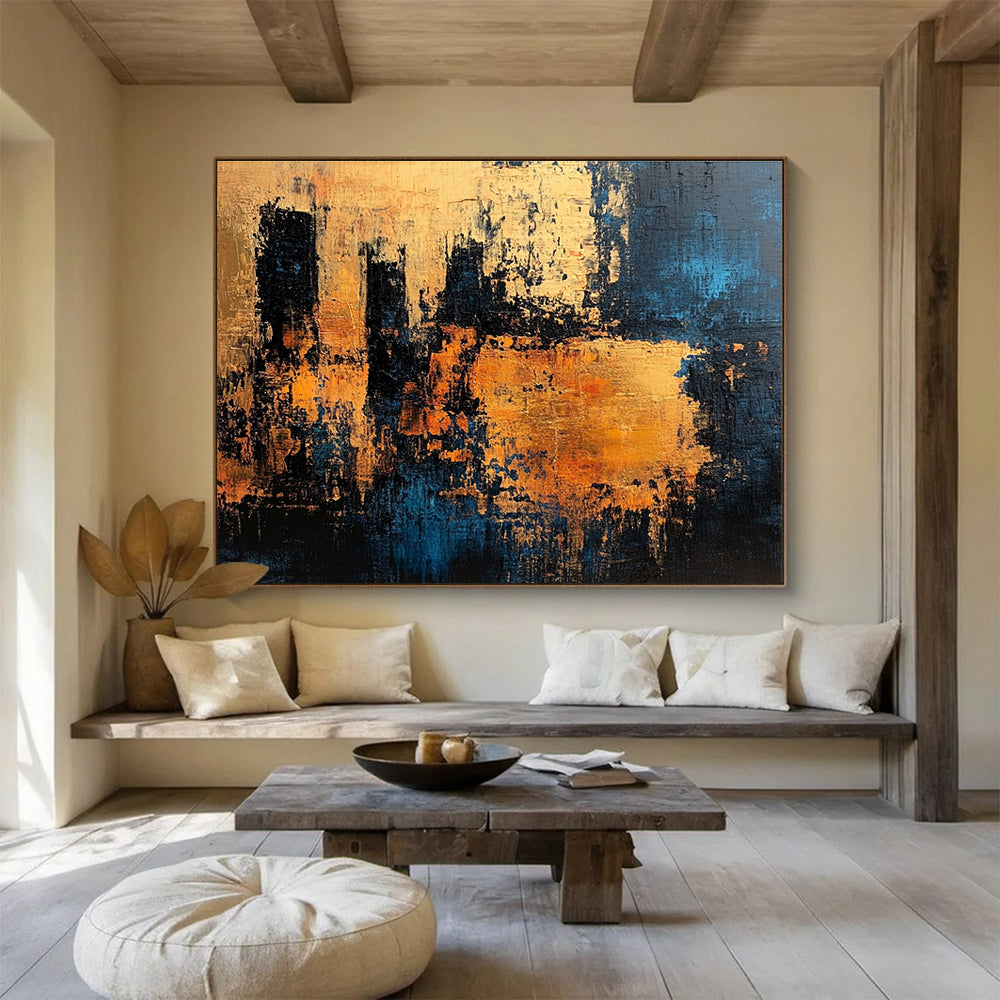 Large abstract painting with textured surface in dark blue and gold suggesting an ancient castle wall radiating warmth and history.SC371