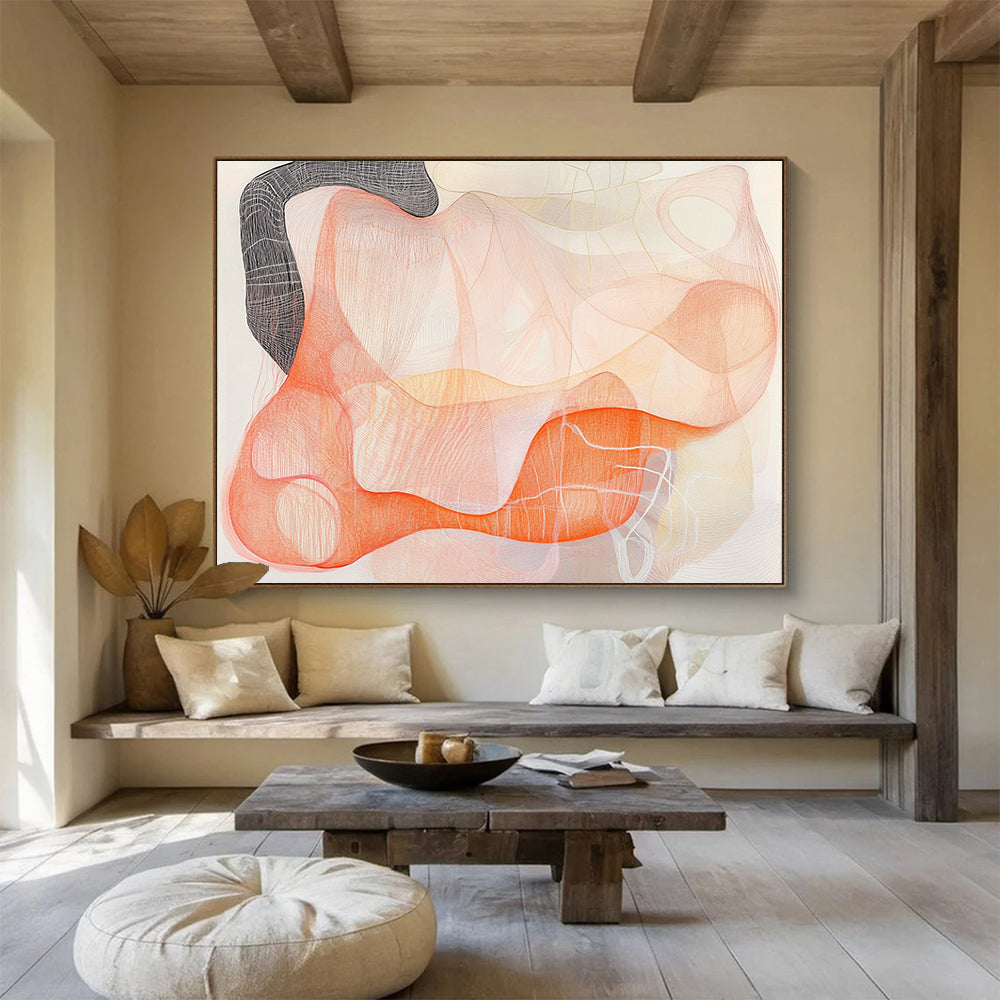 Large abstract artwork featuring delicate orange and pink threads with a black ink outline suggesting women's forms against a white background, evoking calm and elegance.SC304