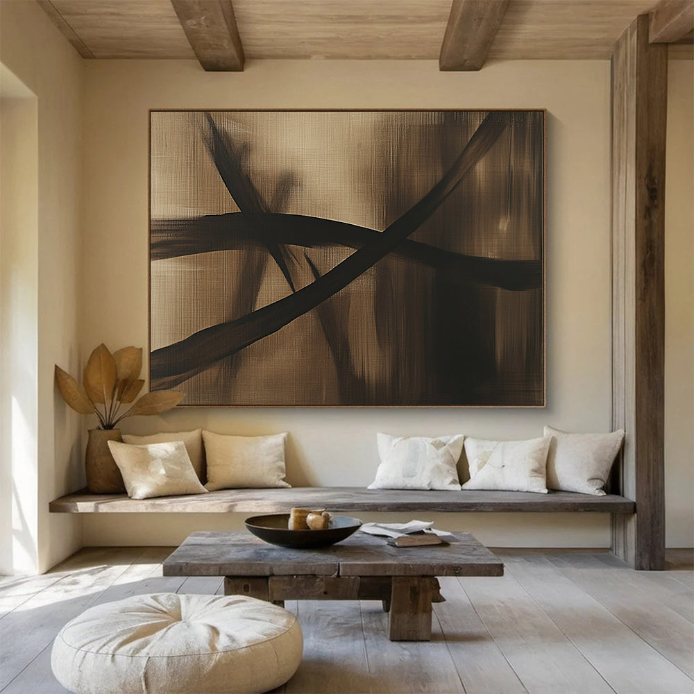 Large abstract painting in brown and black tones featuring a dragonfly silhouette and flowing lines on a dark gray background, exuding mystery and simplicity.SC586