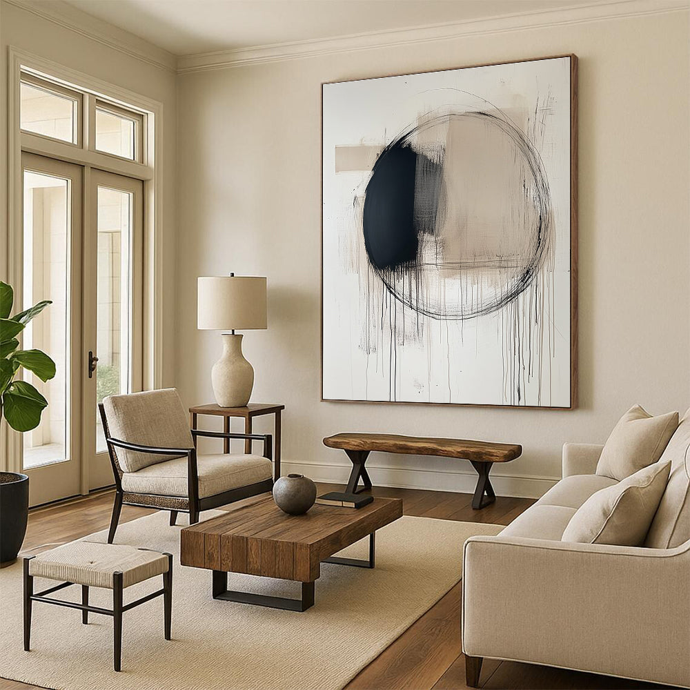 Large abstract painting featuring a central black circle with thin lines and ink drips in soft neutral tones on a white background.STSC253