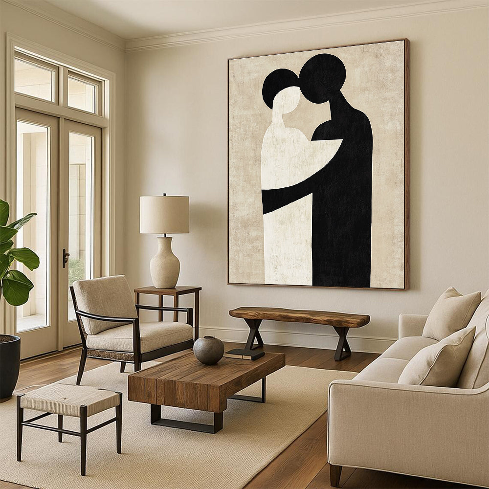 Large abstract artwork featuring black and white shapes that suggest an embrace against a neutral beige background in the style of Paul Klee.STSC473