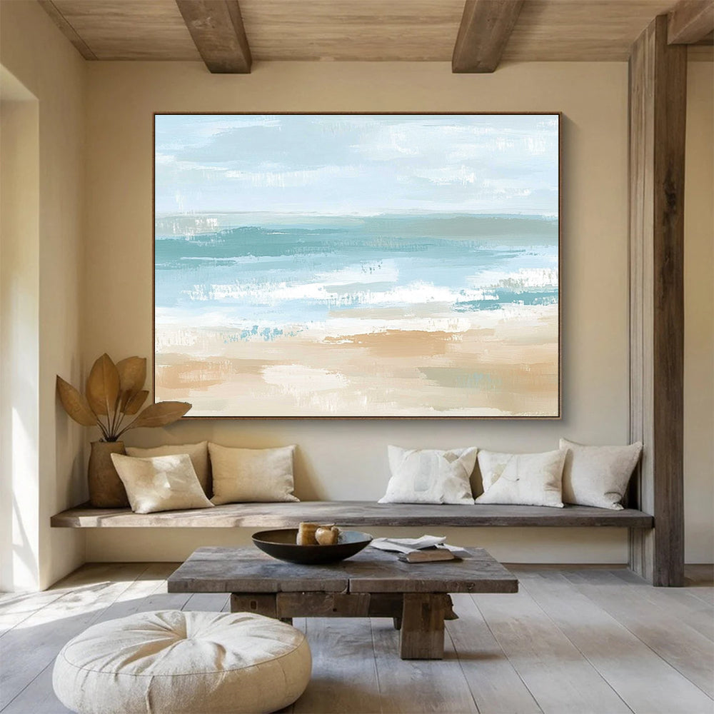 A large abstract painting depicting a serene coastal landscape in soft pastel colors, evoking tranquility with gentle waves and a sandy shore.SC545