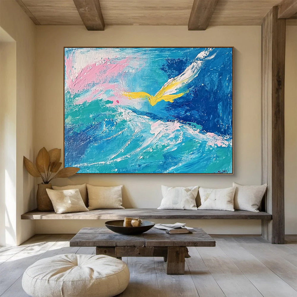 Large abstract painting featuring fluid turquoise and blue tones with pink highlights, a yellow bird, and a whimsical smile hidden within the waves.SC364