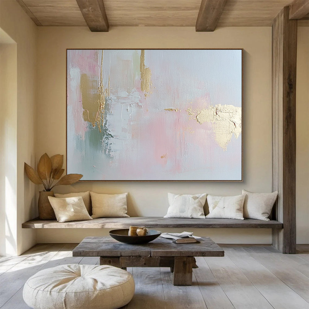 Abstract painting in soft pastel pink and pale gold with delicate brush strokes and textured elegance, enhancing a serene romantic atmosphere.SC386