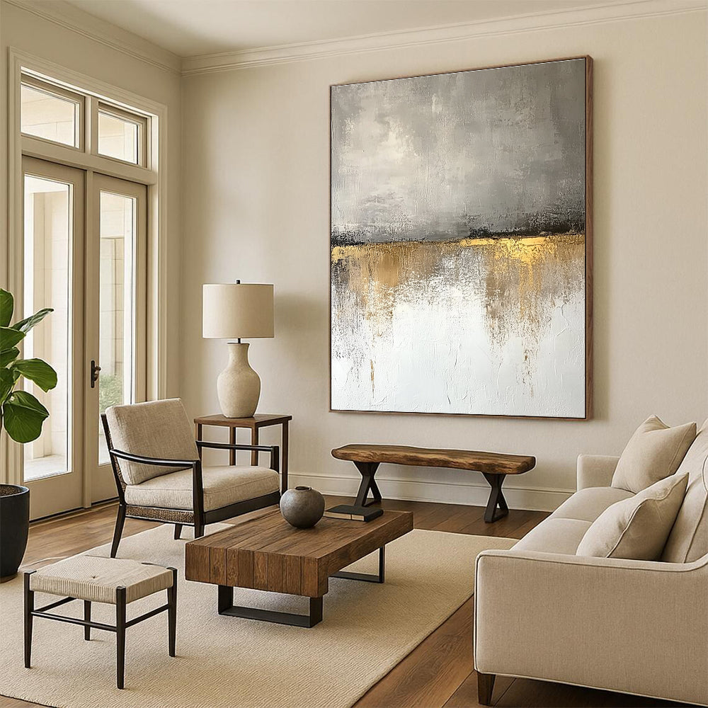 Large abstract painting featuring beige and gray tones with textured wall, golden accents, and a neutral color palette reflecting nature's beauty.STSC410