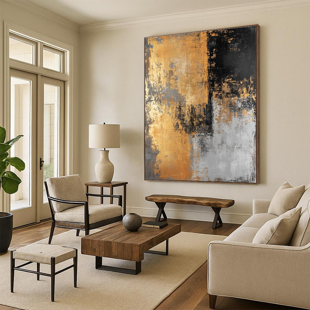 Large abstract painting in golden black and gray hues creates a striking visual impact perfect for modern decor.STSC576