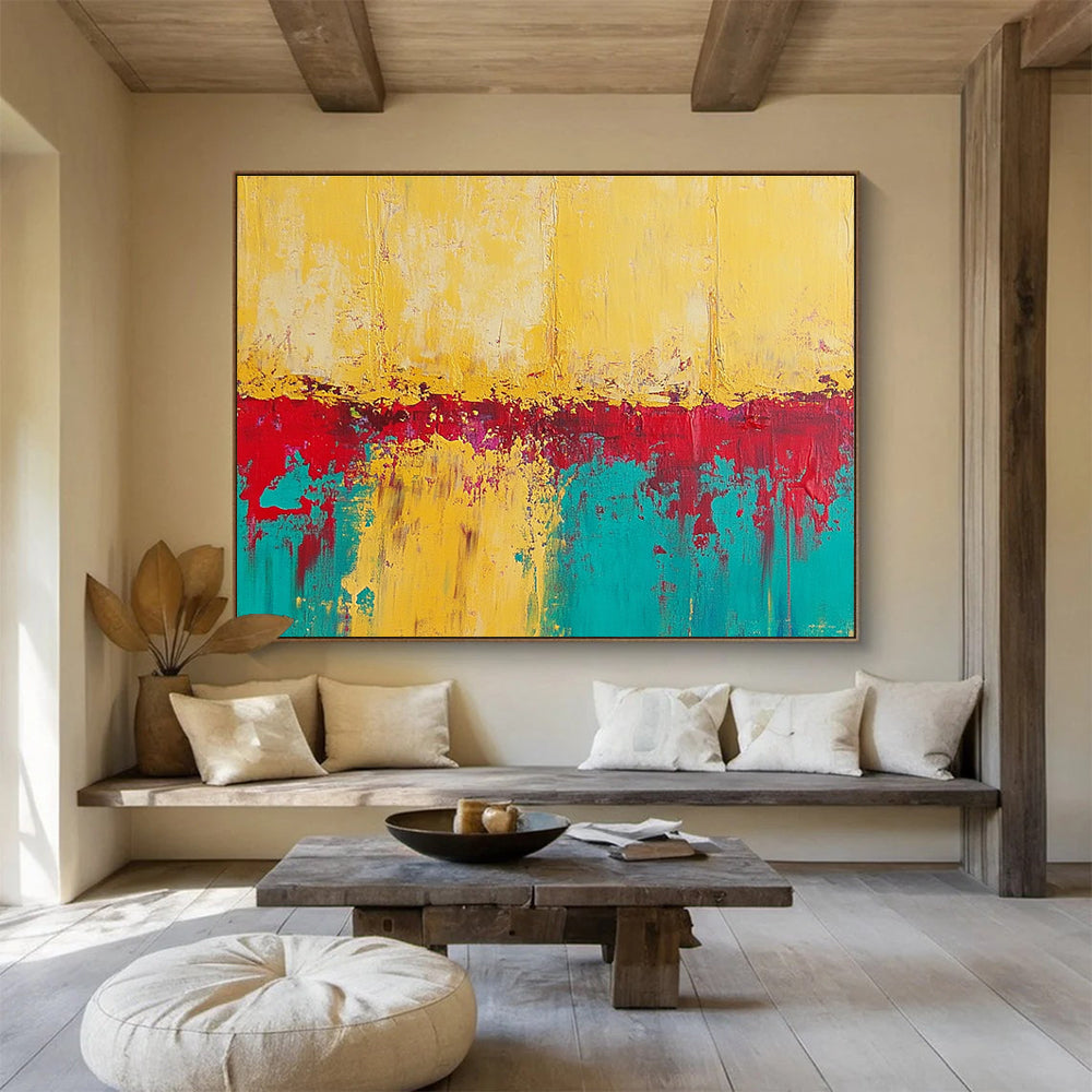 Large abstract painting featuring textured yellow sand with teal and red accents creating a vivid and captivating visual experience.SC269