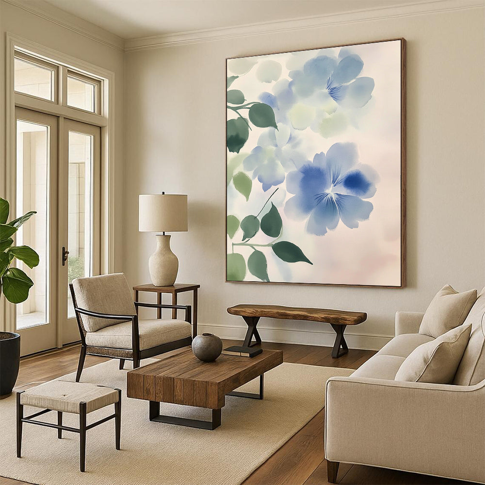 Large abstract watercolor painting of light blue and white flowers with green leaves against a soft gray gradient emphasizing fluidity and movement.STSC1050