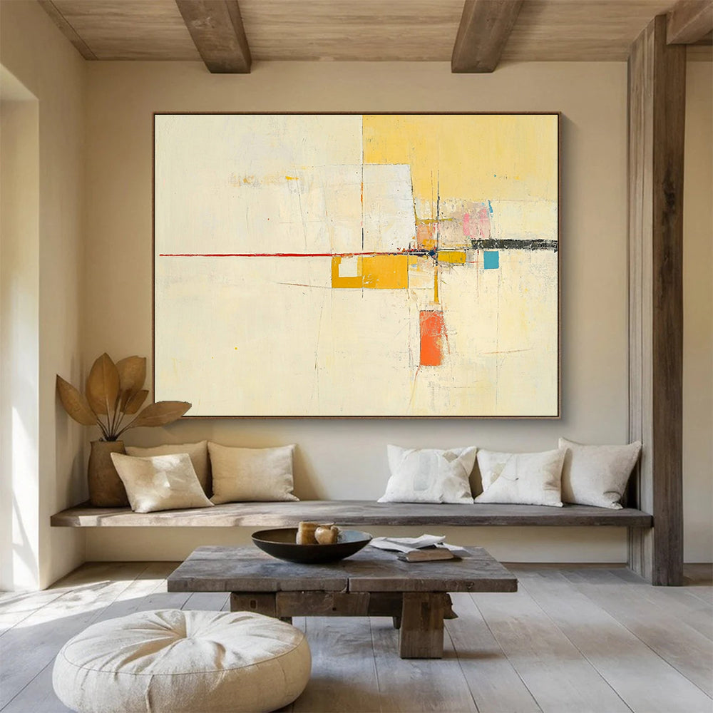 Large abstract painting featuring yellow beige colors thin red line off-white background small blue square soft orange lines geometric shapes and ample white space.SC332