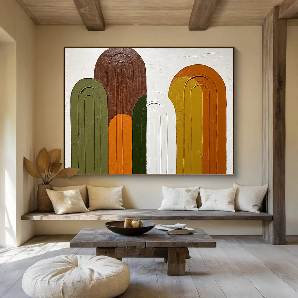 Large abstract painting featuring arches in shades of green brown and orange on a white background with simple colorful shapes.SC590