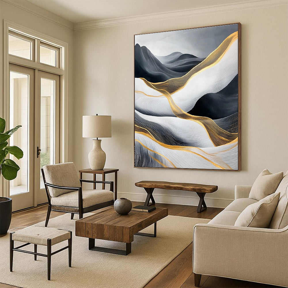 Large abstract painting of flowing waves in light gray and black with gold accents and prominent white areas and mountains.STSC358