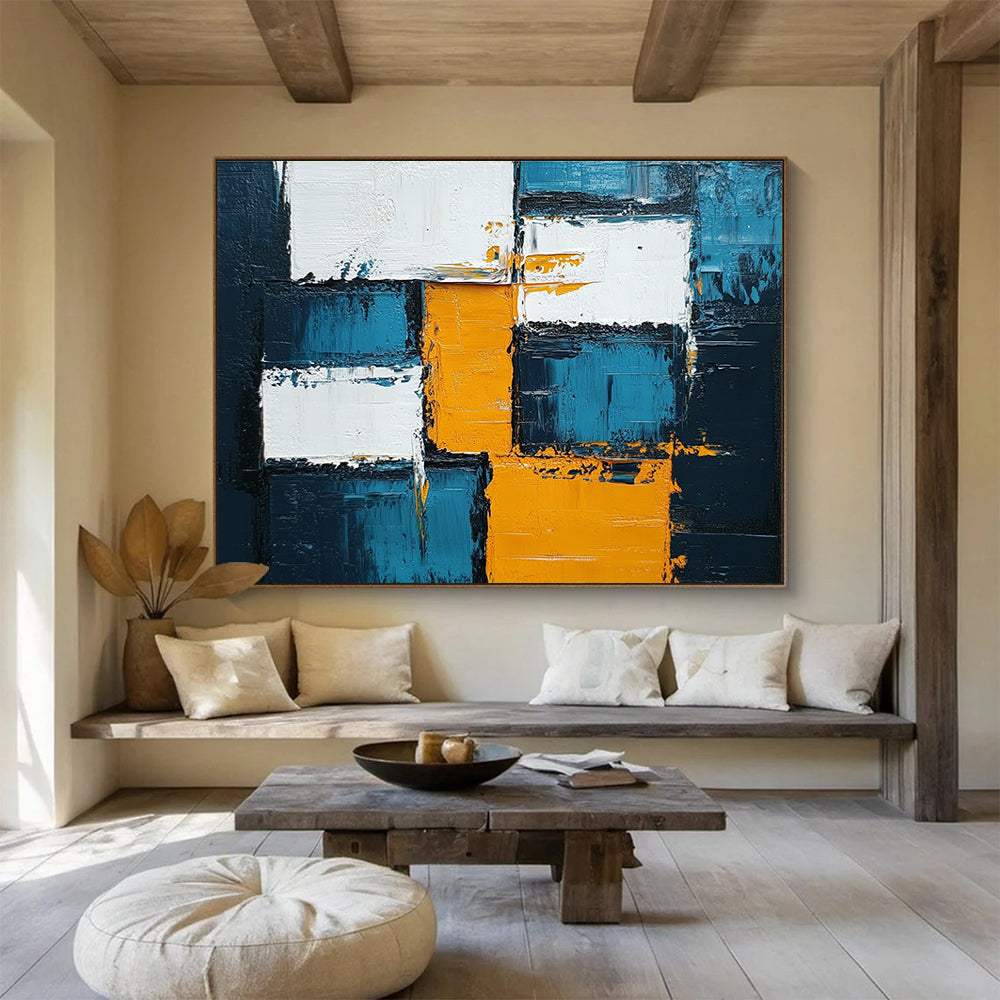 Large abstract painting featuring blue, white, and yellow squares with thick impasto texture, embodying bold expressionism for any modern space.SC122