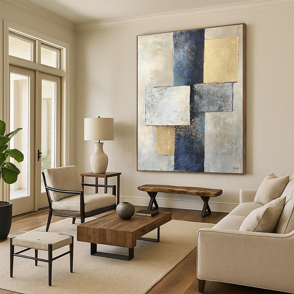 Abstract painting featuring two squares and one rectangle in varying shades of gray on textured paper with a beige and blue color palette.STSC715