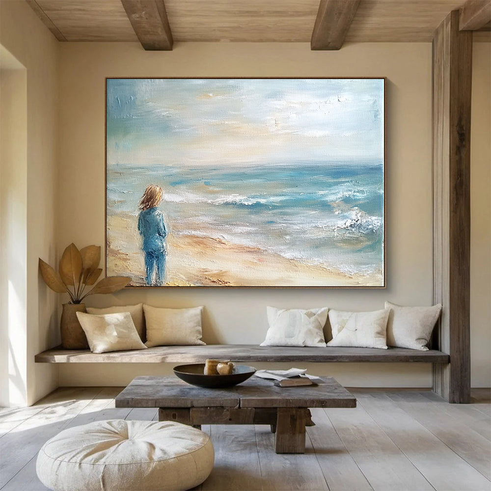 An abstract painting of the ocean and beach in light blue tones and muted colors creates a serene and beautiful atmosphere.SC411
