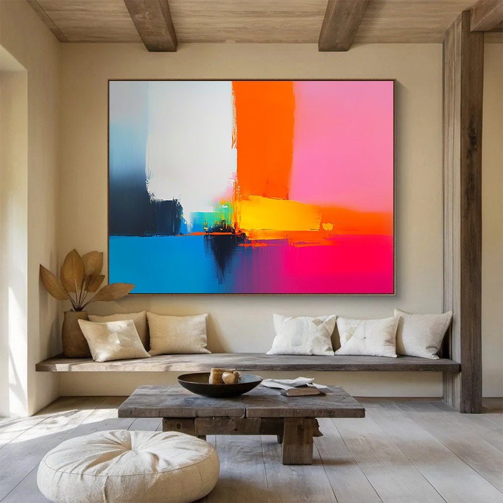 A large abstract painting featuring bold shapes and clean lines in pink orange blue yellow and white inspired by Peter Wileman's brushstrokes.SC505