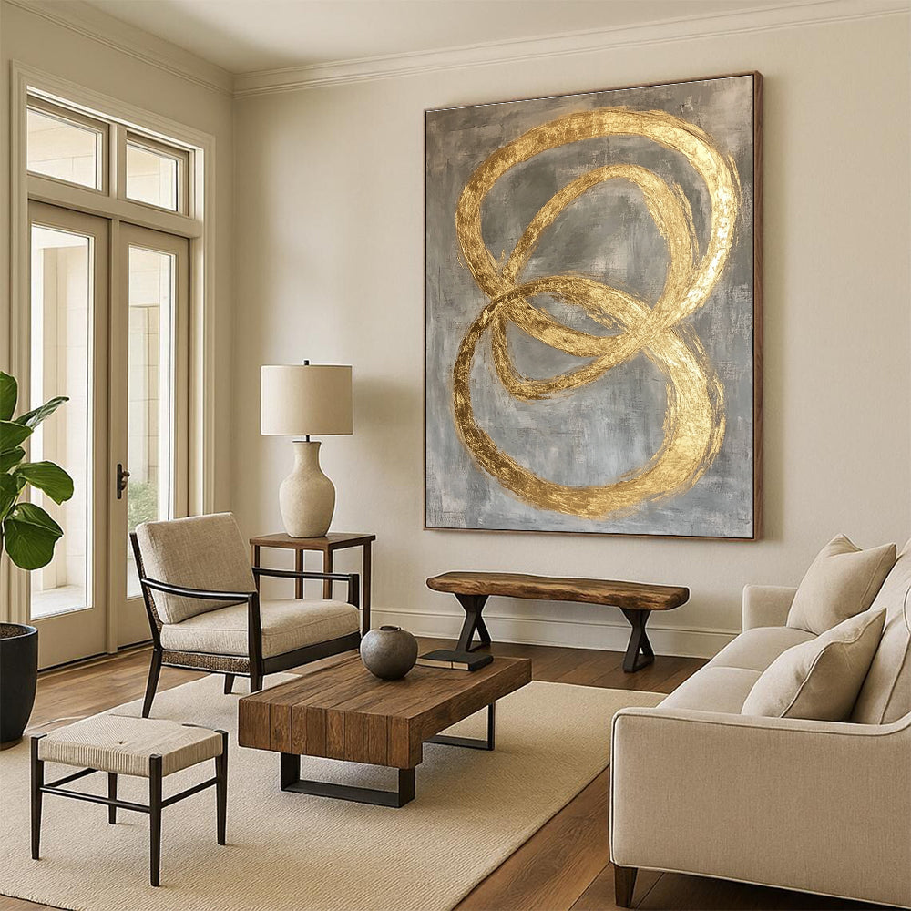 Large abstract painting featuring intertwined O-shapes in gold leaf on a modern grey background.STSC1295