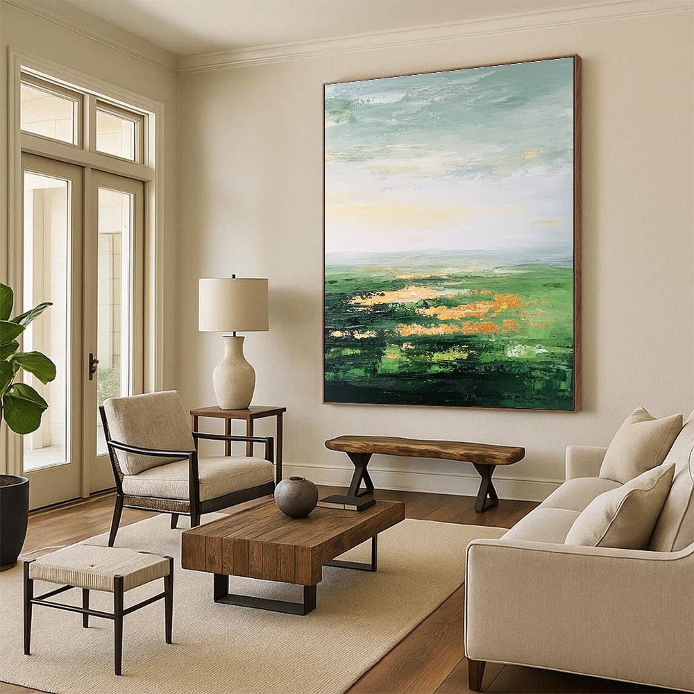 Large abstract painting featuring a vast green landscape soft sky gold accents and thick brush strokes for a dreamy blurry effect.STSC887