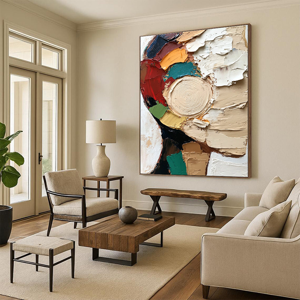 Large abstract painting featuring a textured close-up of a face in vibrant colors and dynamic brush strokes against a white circular patterned background.STSC283