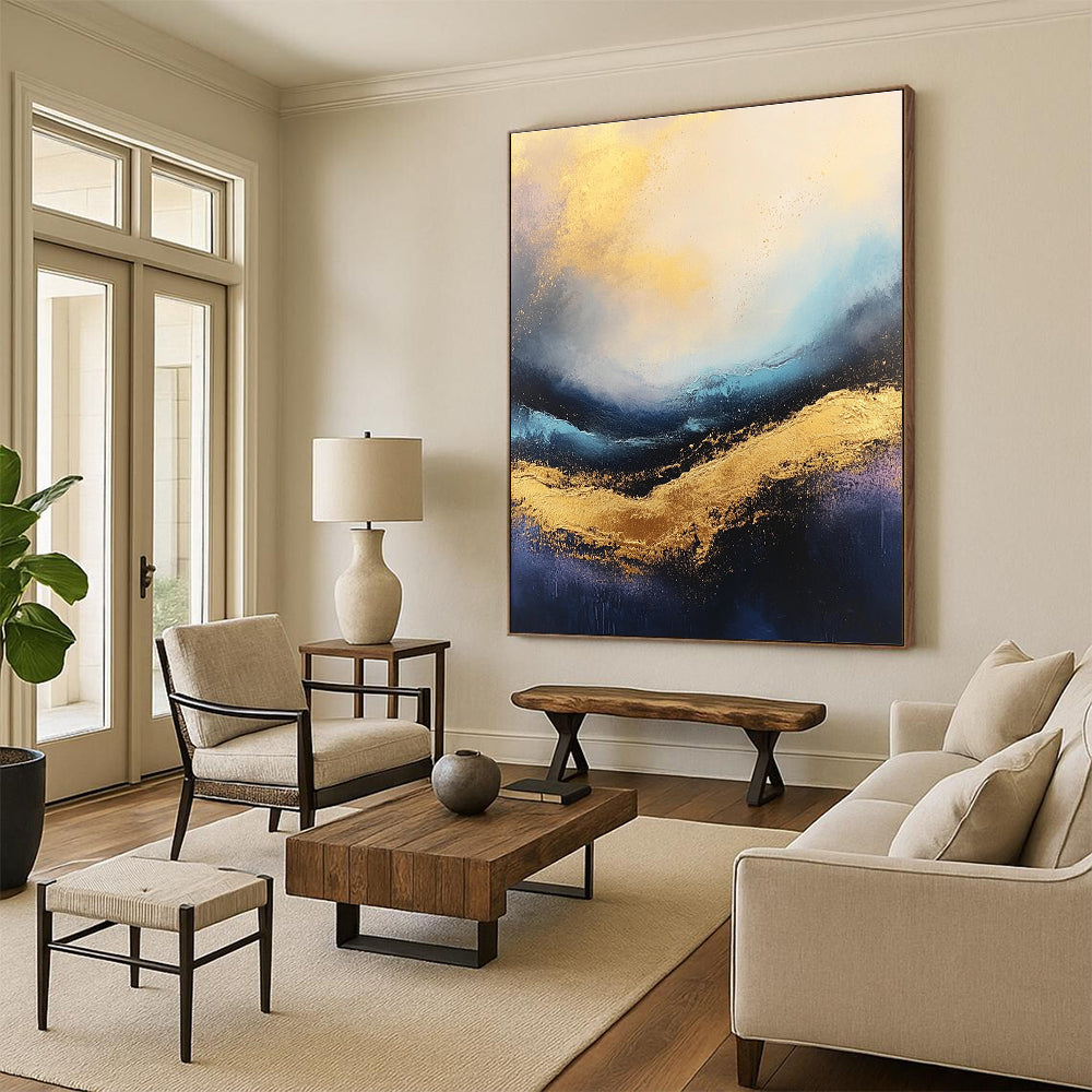 Large abstract painting of stormy seas featuring rich gold and blue tones with a captivating textured surface.STSC333