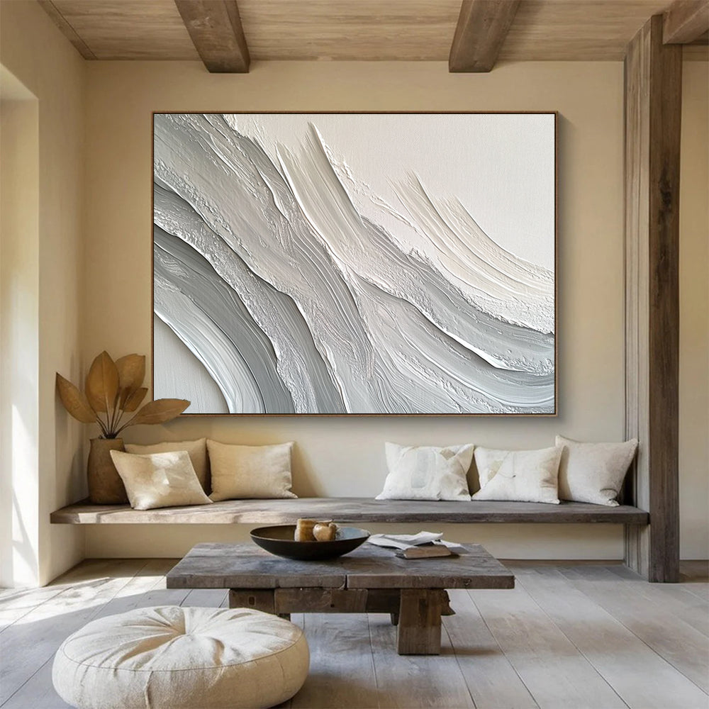 Large abstract painting featuring swirling white and gray patterns that create depth and texture against a plain background.SC451