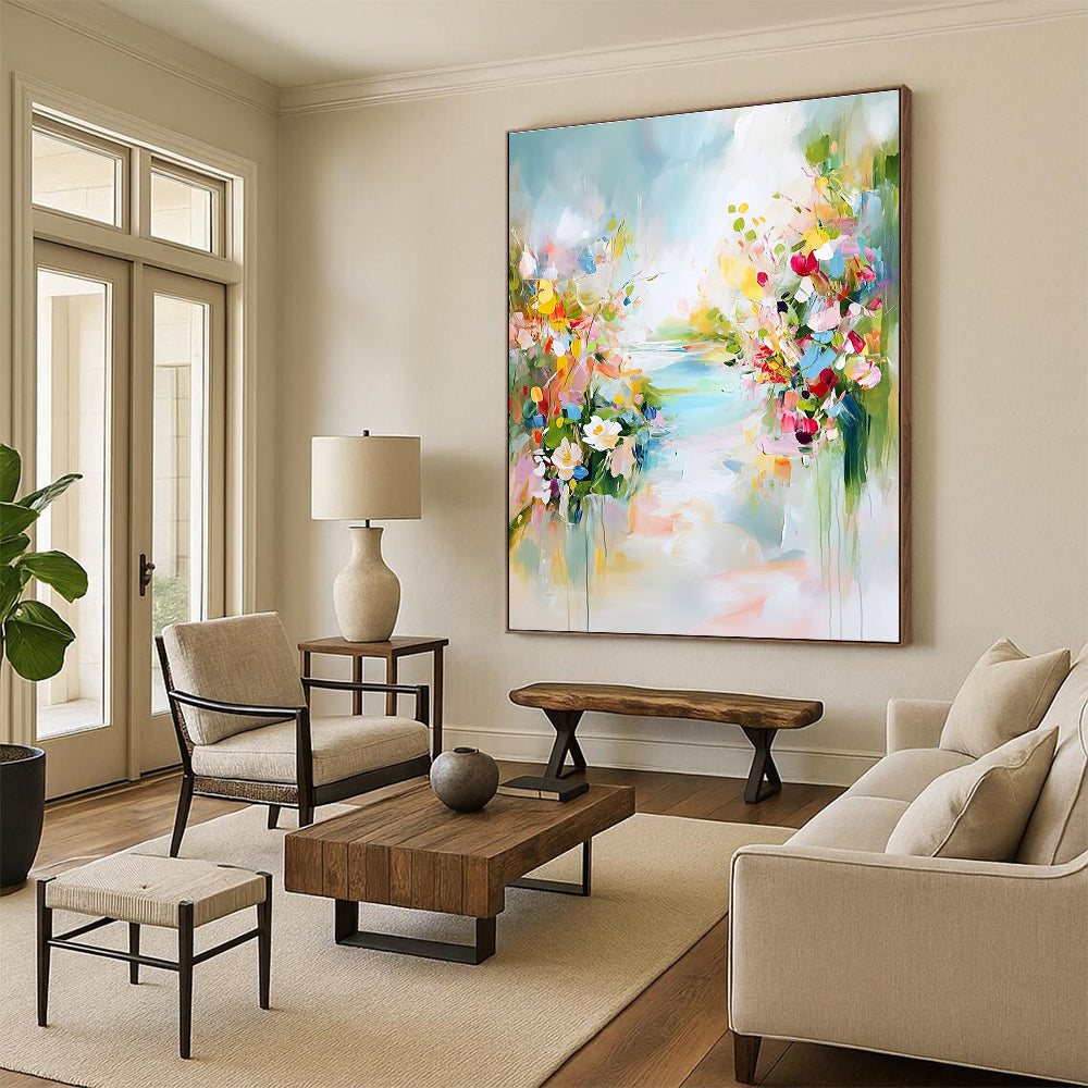 A large abstract painting depicting a tranquil spring landscape with colorful flowers soft skies and hints of blue water.STSC891