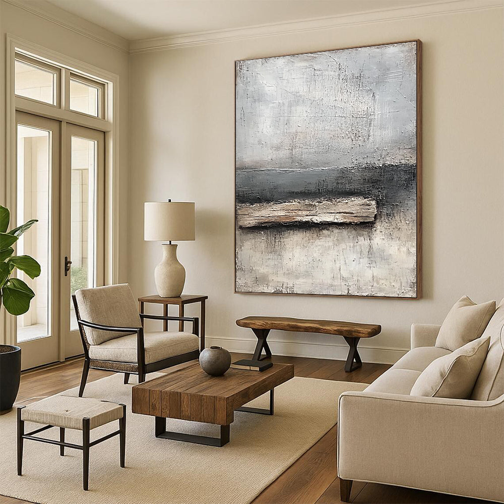 Abstract painting featuring neutral tones of gray and white with textured canvas and thick paint highlighting a small piece of old wood by the water's edge.STSC138