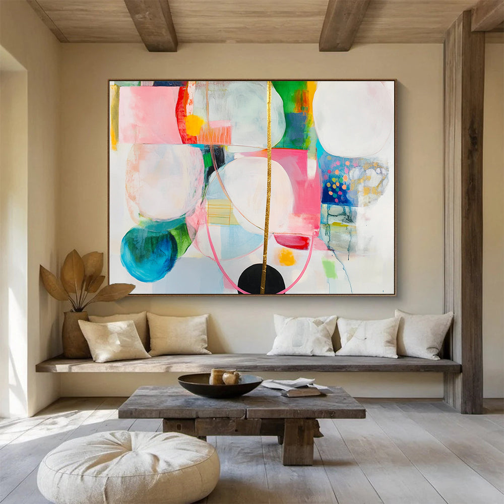 Large abstract painting with colorful shapes, gold lines, and a hanging golden string, featuring a black circle on a white background.SC375