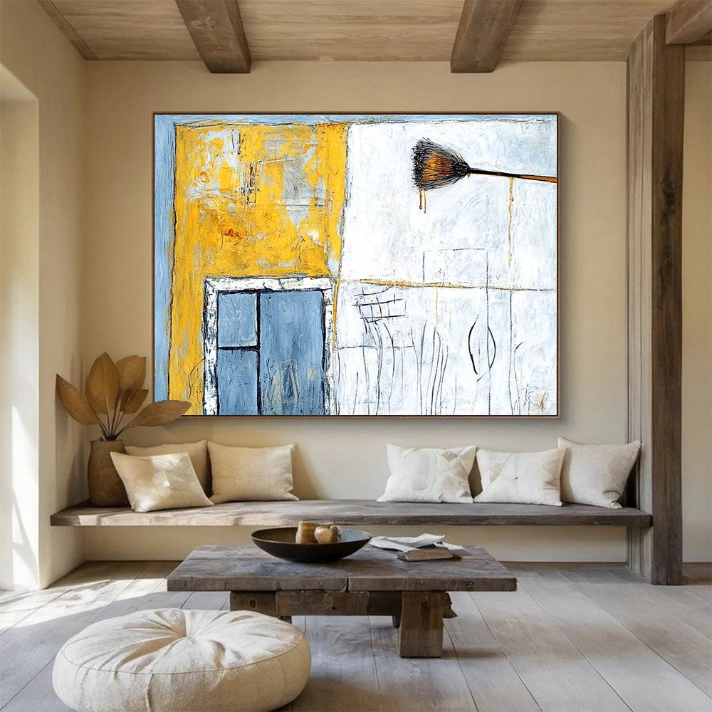 Large abstract painting featuring an old building in yellow and white with an open window and light blue wall details.SC164