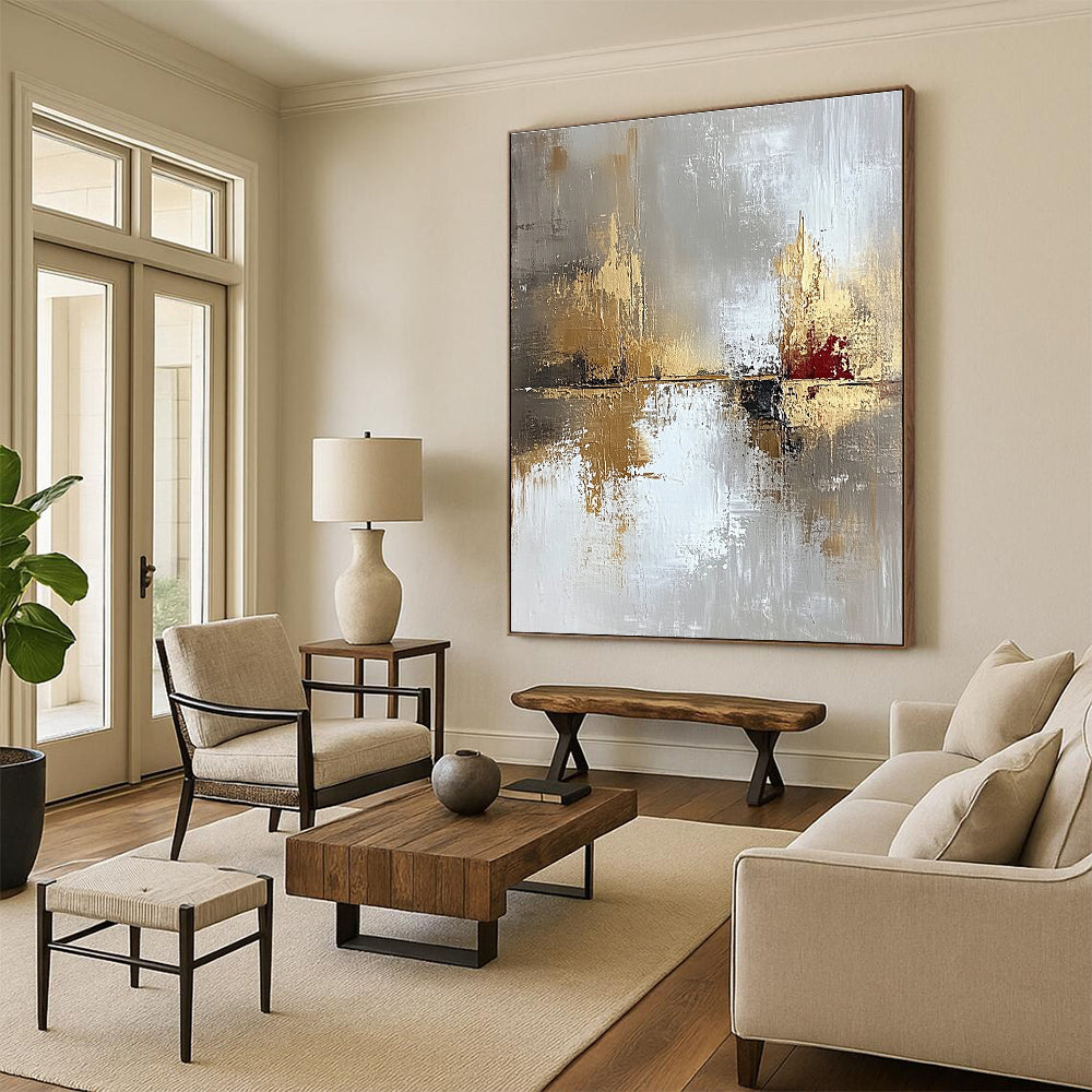 Large abstract painting in light gray and gold with oil brush effect featuring layers of texture and subtle red accents for visual impact.STSC402