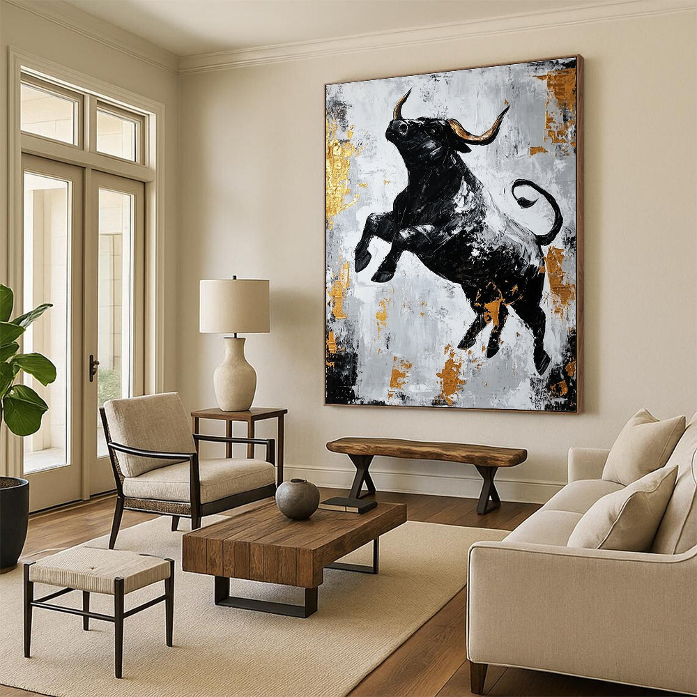 Large abstract painting featuring a dynamic black bull in gold and gray with strong contrasts and rough brushstrokes conveying powerful strength.STSC913
