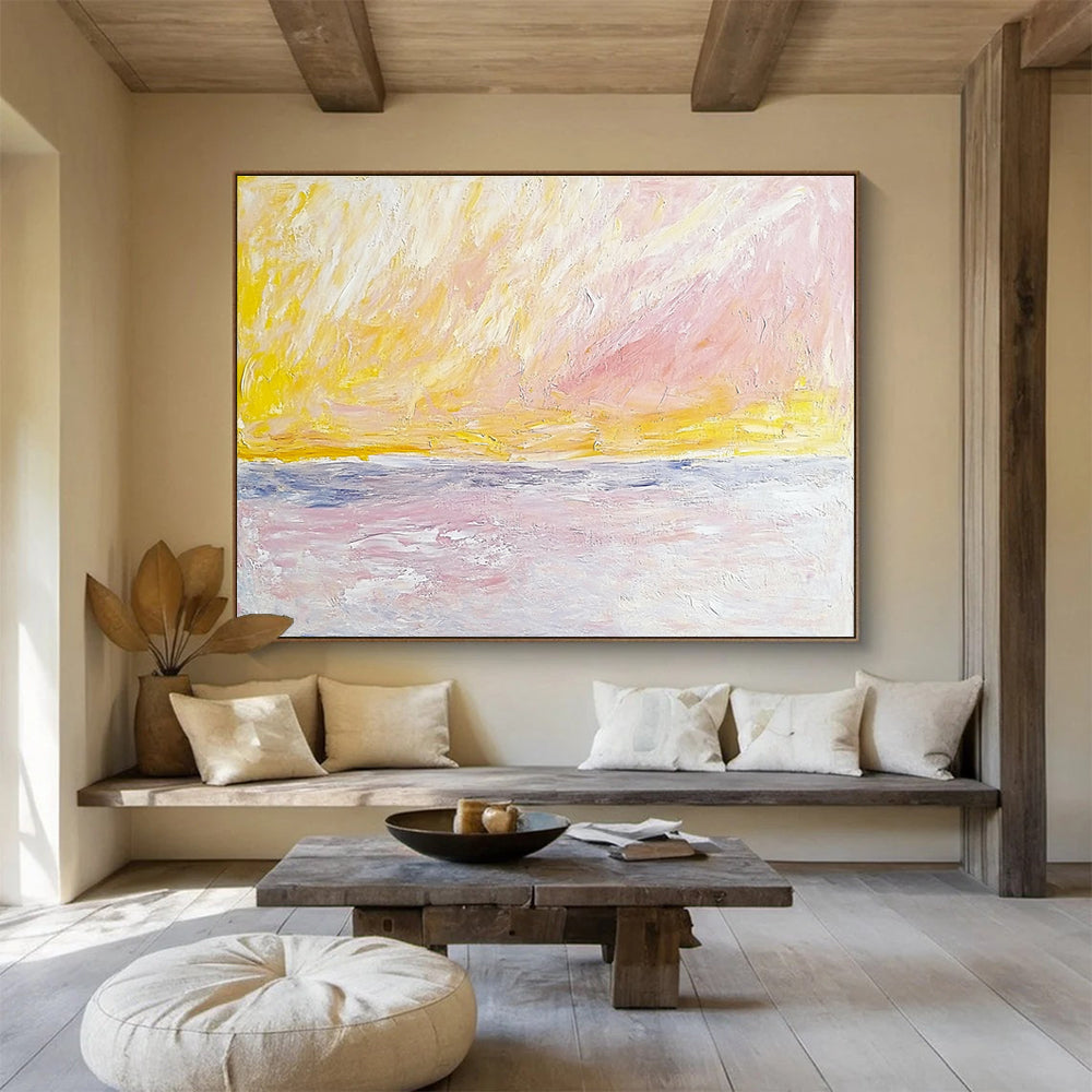 Large abstract painting of sky and sea in Turner style featuring pale pink yellow and beige colors with bold brush strokes.SC365