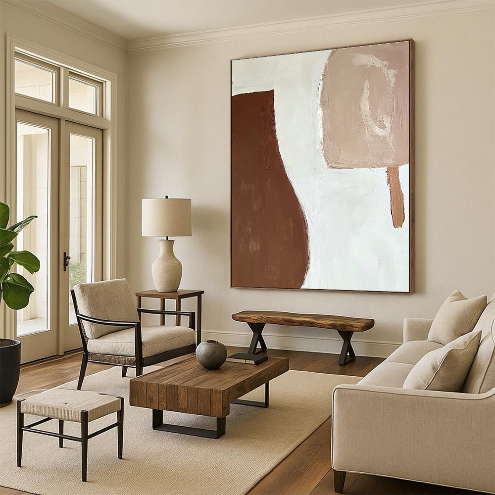Large abstract painting featuring organic brown and white shapes with fluid brush strokes creating a calm serene atmosphere against a plain white background.STSC694