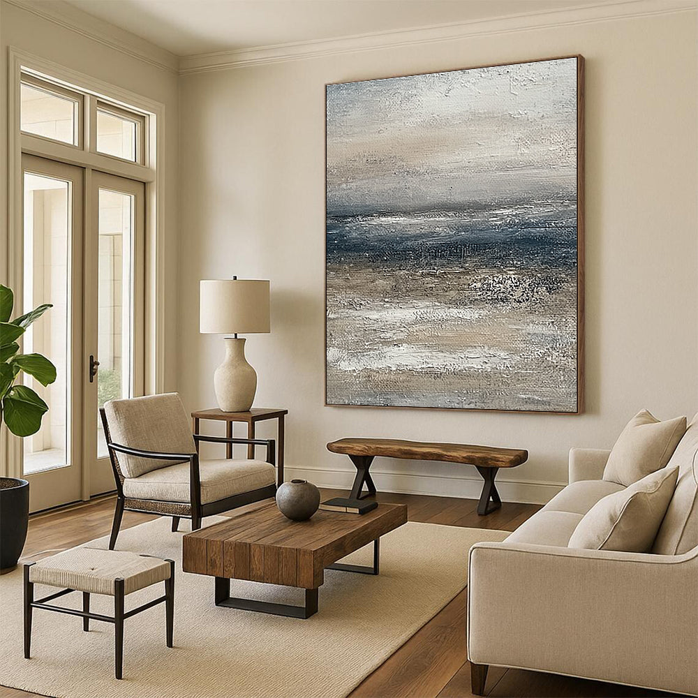 Large abstract painting of the ocean featuring muted beige and grey tones with a soft textured effect on canvas.STSC833