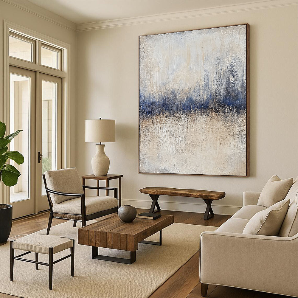 Large abstract painting featuring textured beige and blue tones with vintage aesthetics and impasto technique on a layered gray background.STSC732