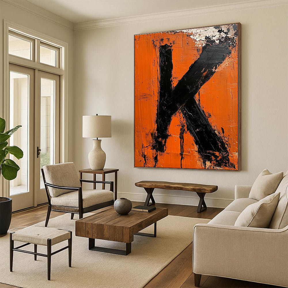 Large abstract impasto oil painting featuring the letter K in vibrant orange and black inspired by minimalist design.STSC1326