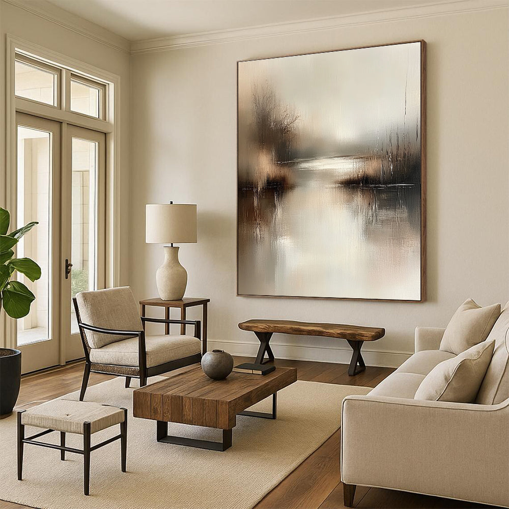 Large abstract painting in muted beige and grey tones captures serene water's edge with gentle brushstrokes evoking tranquility and calmness in any setting.STSC078