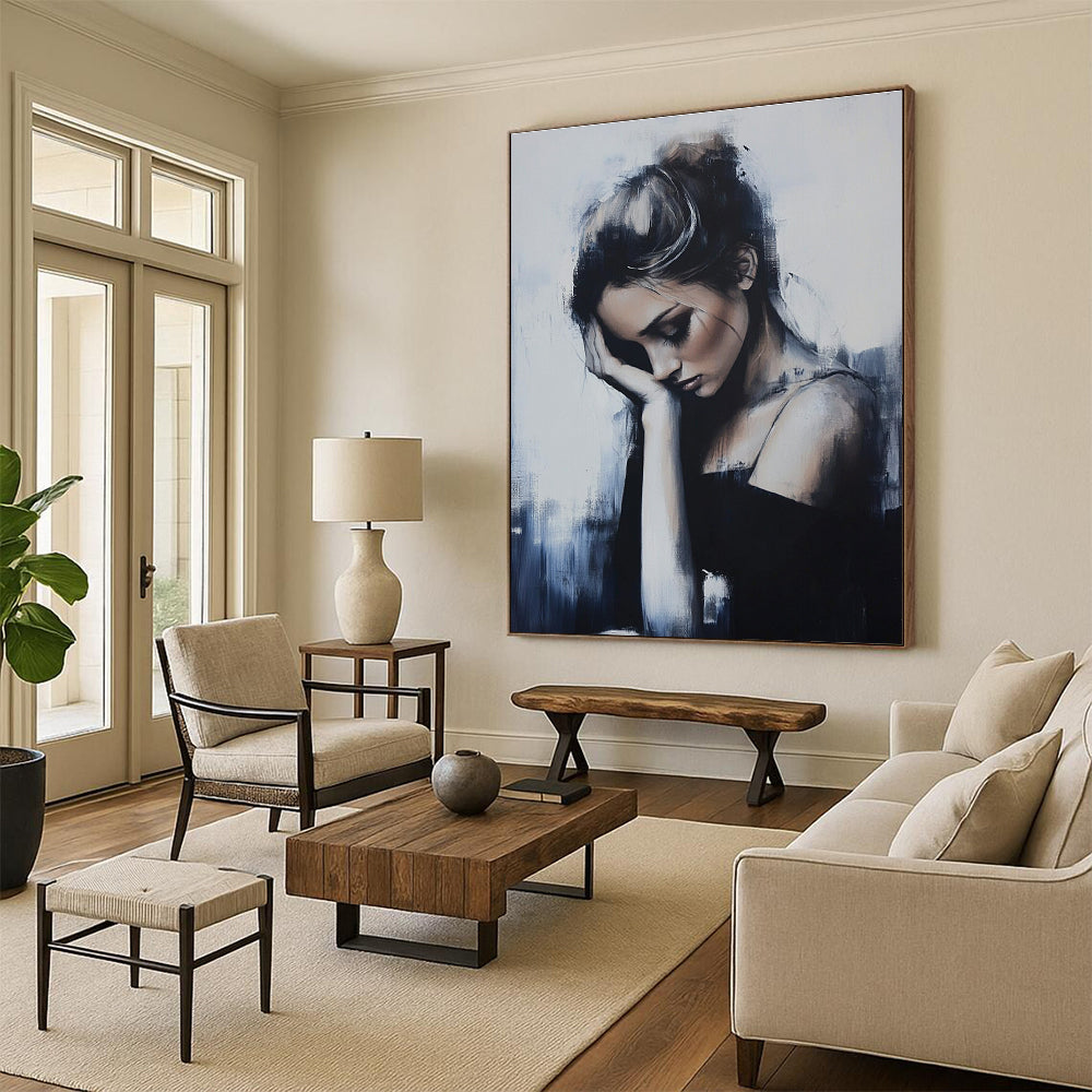 Abstract painting featuring a woman in soft tones with elegant figures and broad brushstrokes set against a minimalist background of gray and blue hues.STSC1266